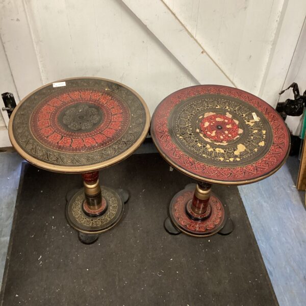 Antique Dian wine tables with inlaid designs and tripod legs.