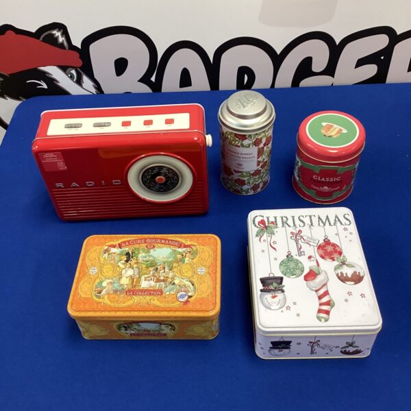 Lot of five vintage Christmas biscuit tins, festive collectible storage.