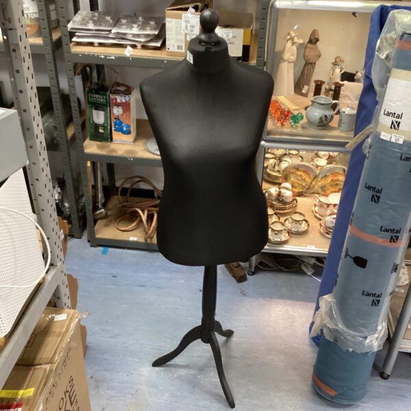 Vintage Taylor manikin on stand for clothing display.