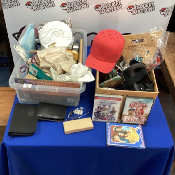 Mixed lot of DVDs, VR headset, and Christmas bowl covers.