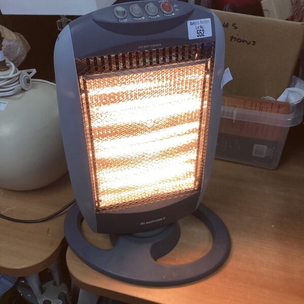 Front view of a compact Blaupunkt electric heater with heat settings.