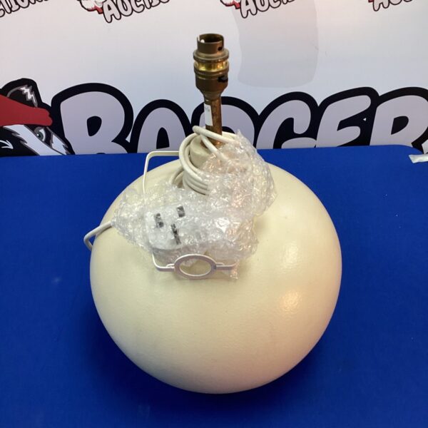 Vintage ball table lamp with frosted shade.
