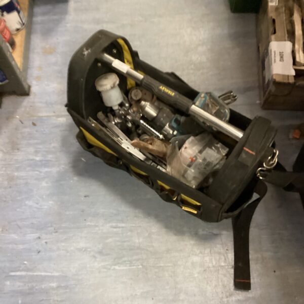 Used Stanley Fatmax tool bag filled with various tools.