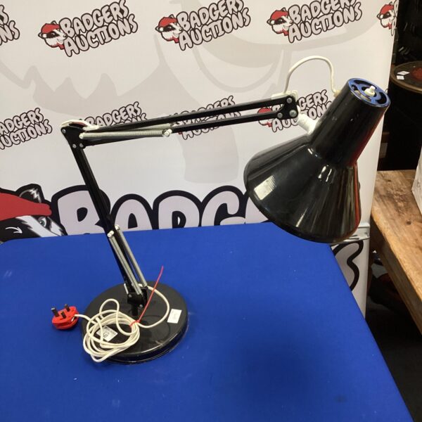 Vintage Anglepoise lamp with adjustable arm and conical shade.