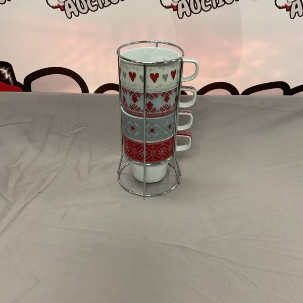 NEXT Arden patterned mugs displayed on a stand.