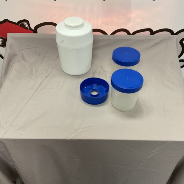 White electric yogurt maker container for homemade probiotic yogurt.