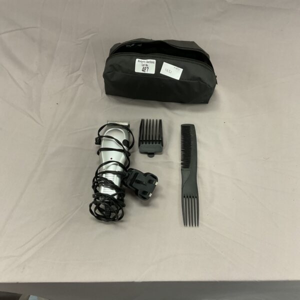 Jhon Lewis hair clippers set with comb attachments and apron.