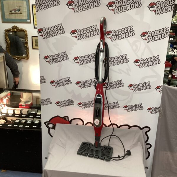 Shark Steam Mop handheld floor cleaner appliance.