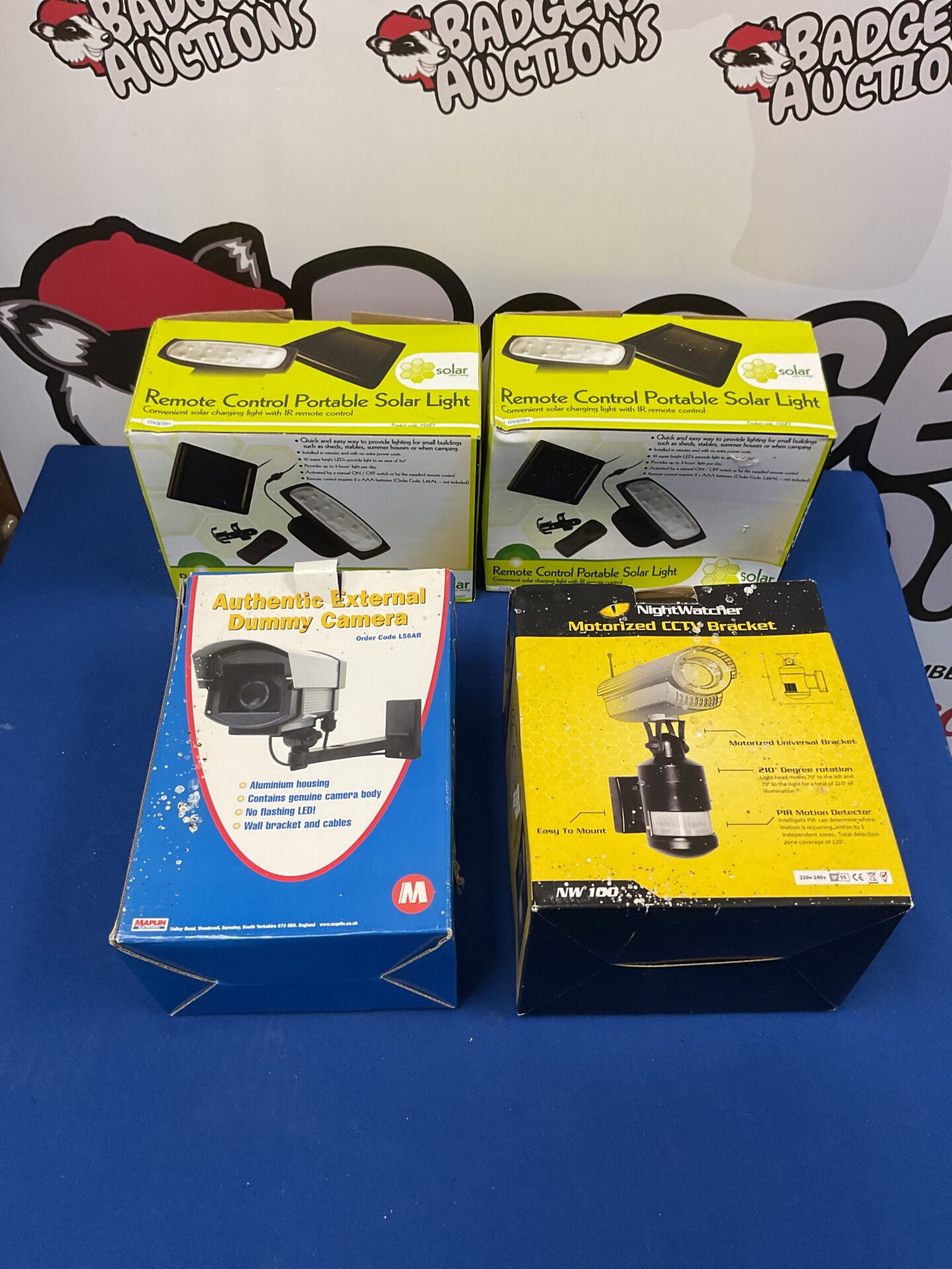 215 Two remote control portable solar lights with dummy cctv camera and bracket