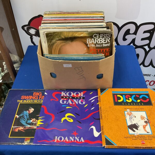 Vintage vinyl record collection featuring jazz and Kool and the Gang.