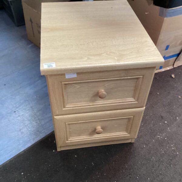 Small limed oak bedside cabinet with drawer and cupboard.