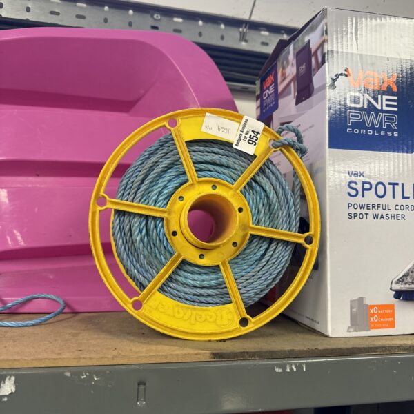 Yellow spool of Vax nylon rope for cleaning or garden use.