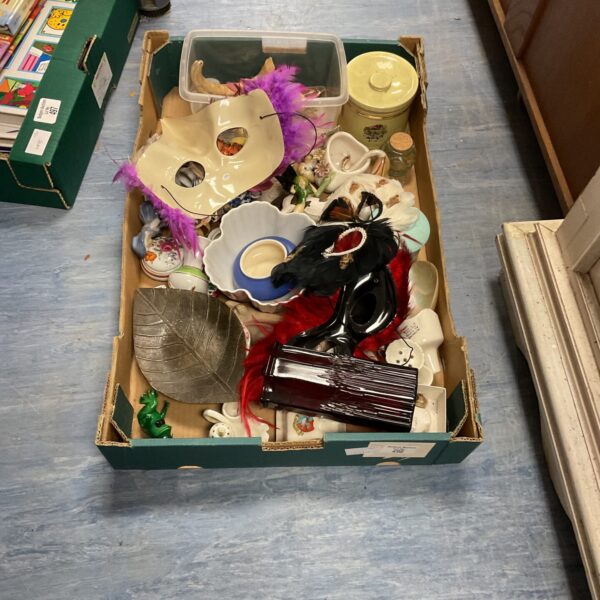 Mixed lot of vintage masks, pottery and collectible magnets.