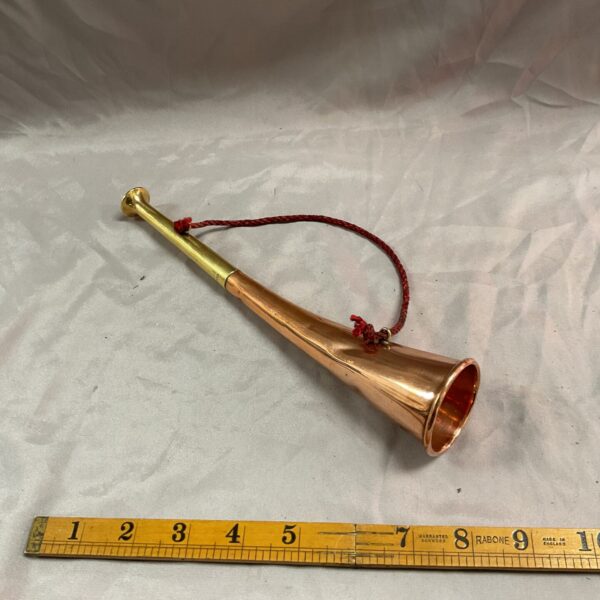Vintage copper and brass hunting horn for collectors.