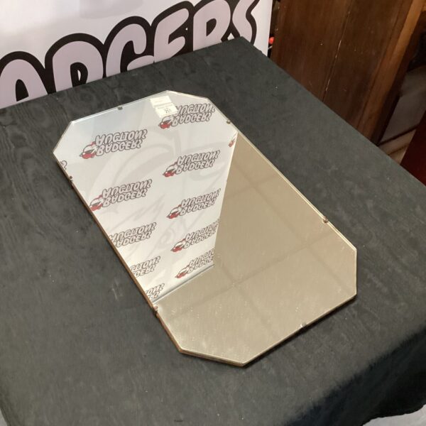 Vintage 22x13 mirror with aged silvering and classic design.