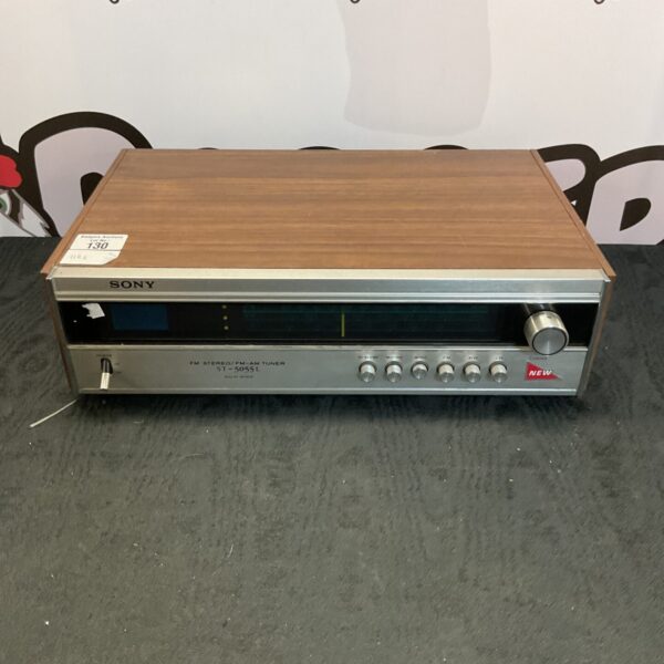 Vintage Sony ST-50551 FM stereo tuner with woodgrain finish.