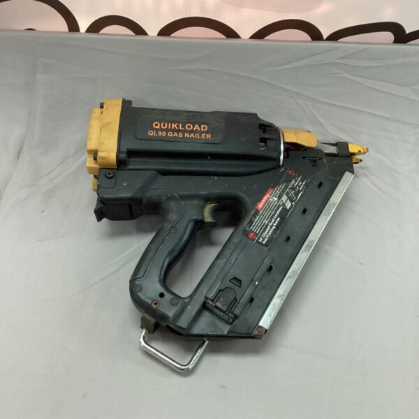 Vintage Quickload gas nailer for construction and woodworking.