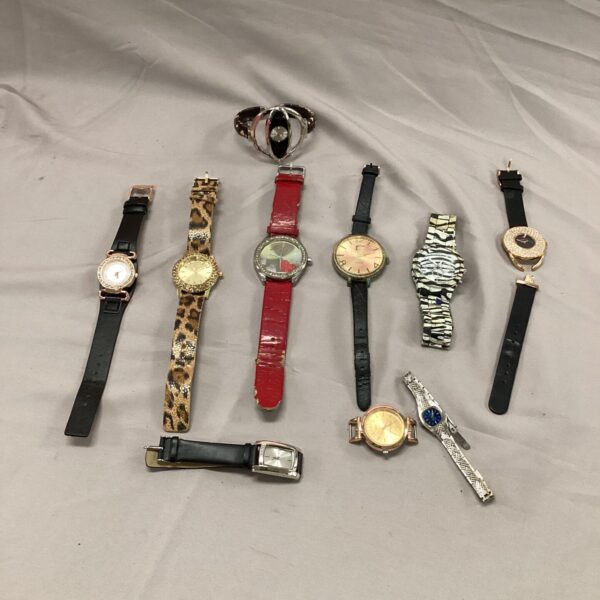 Tray of assorted wrist watches, vintage and fashion styles.