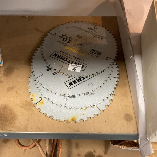 Lot of four vintage Craftsman circular saw blades for woodworking projects.