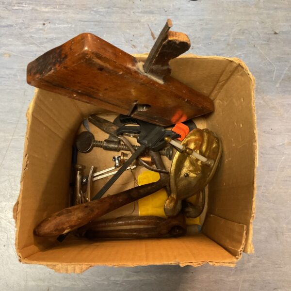 Mixed tool lot featuring mole grips and G clamps for DIY projects.