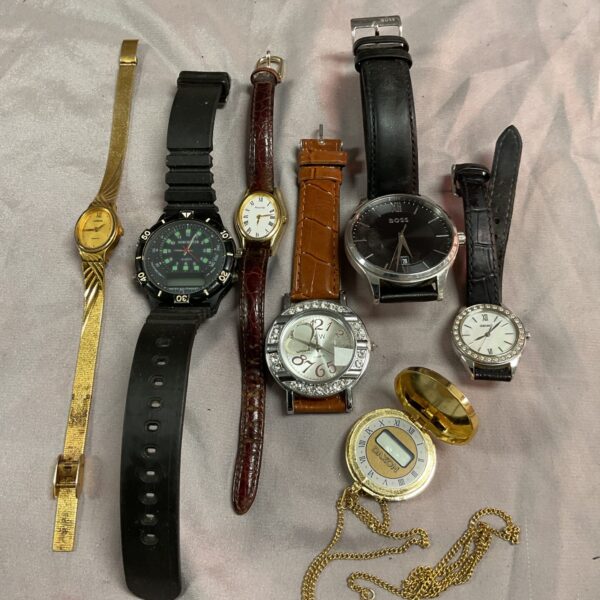 Tray of assorted vintage watches for collectors and enthusiasts.