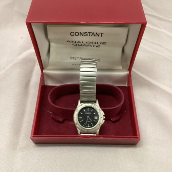 Vintage Constant analogue wristwatch with stainless steel bracelet.