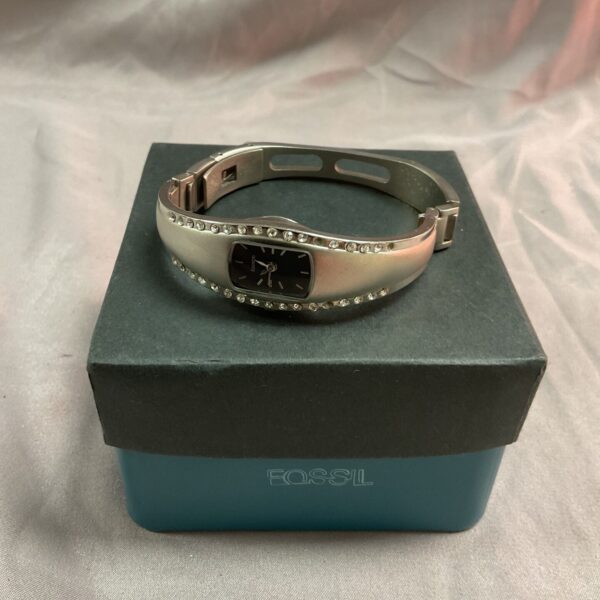 Fossil ladies quartz wristwatch with stainless steel band.