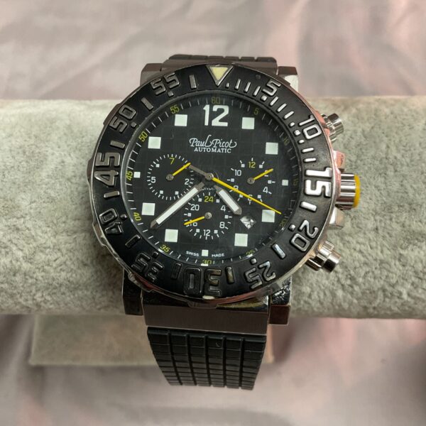 Paul Picot automatic watch with black dial and stainless steel bracelet.