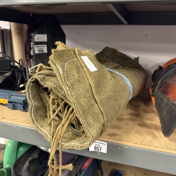 A pile of vintage hessian sacks for storage and crafting.