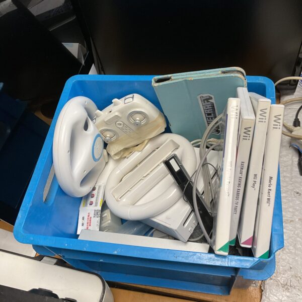 Nintendo Wii console and controllers in used condition.