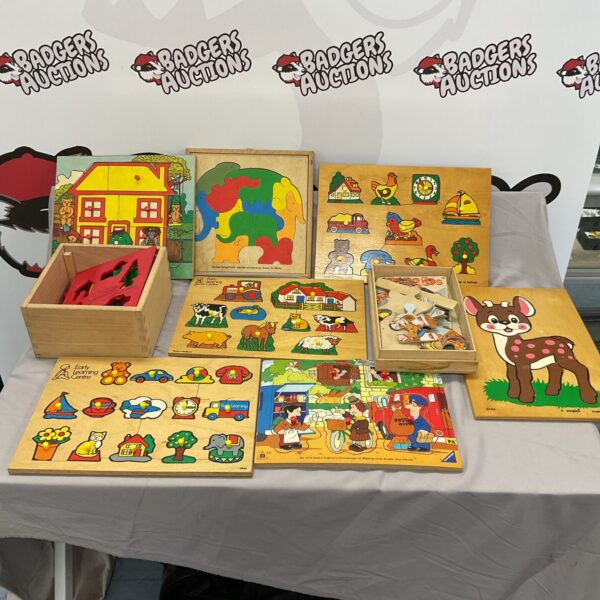 Collection of vintage wooden jigsaw puzzles for children.