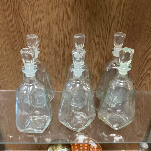 Lot of six vintage Scottish hlass decanters for spirits.