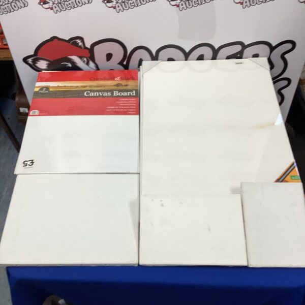Lot of eight blank canvas boards for painting and art projects.