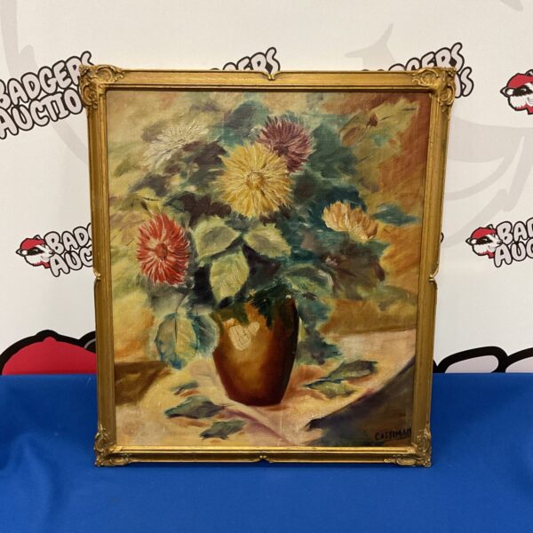 Vintage Cassiman still life oil painting of flowers in a vase.