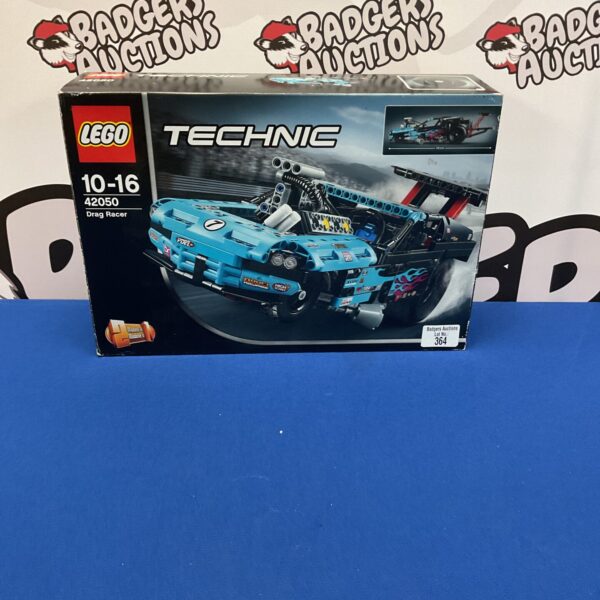 Lego Technic 42050 drag racer building set on display.