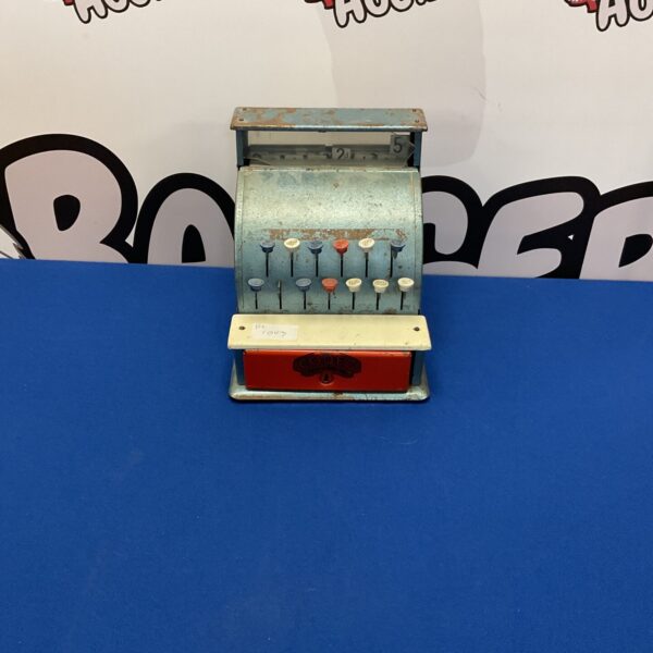 Vintage Codeg toy cash register, a collectible tin toy.