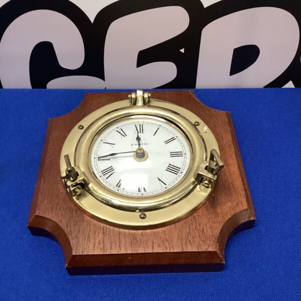 Vintage H Samuel wall clock with Roman numerals.