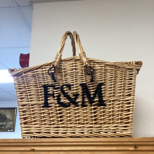 Large wicker F&M style basket with a sturdy handle.