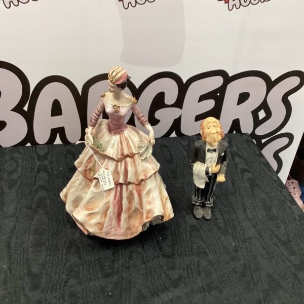 G Girardi porcelain figurine of a lady and butler.