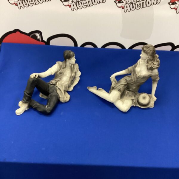 D’ Adore figurines by Mod Pat, a stylish couple.