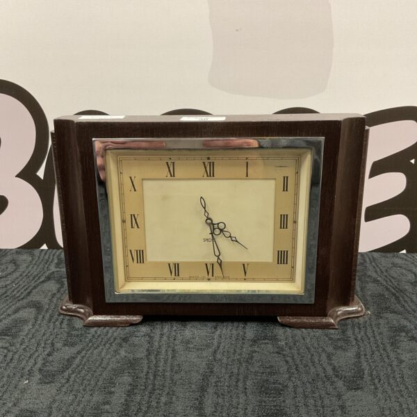 Vintage Smiths art deco mantle clock with silvered dial.