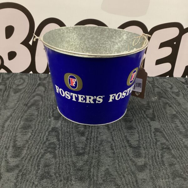 Vintage blue Fosters ice bucket, classic barware collectible.