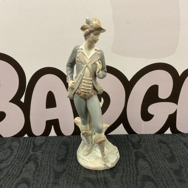 Detailed Lladro porcelain figurine of a classical gentleman.