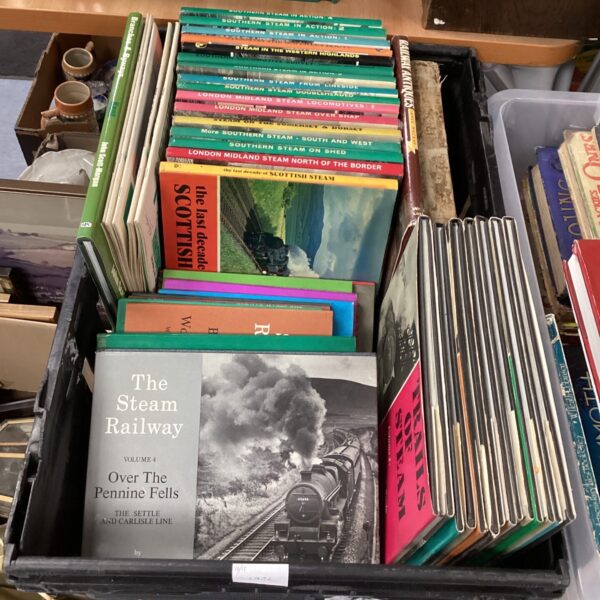 Stack of vintage railway steam train books for collectors.