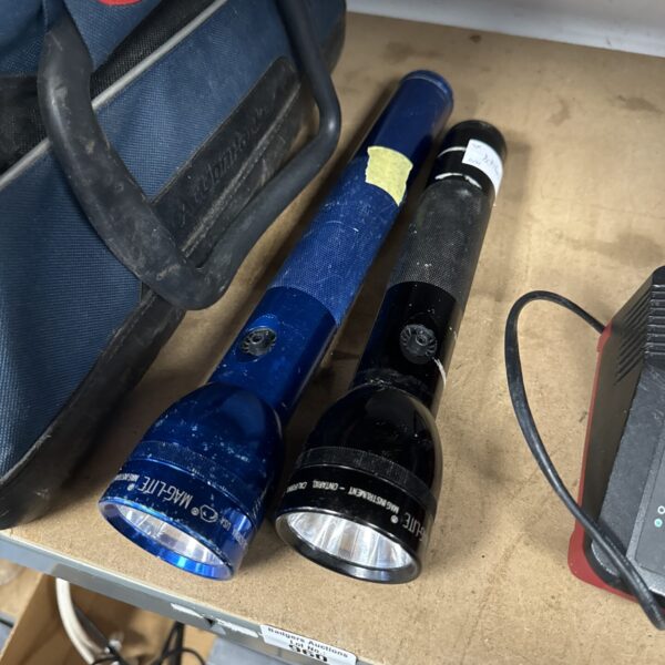 Lot of two vintage Maglite torches with a storage bag.