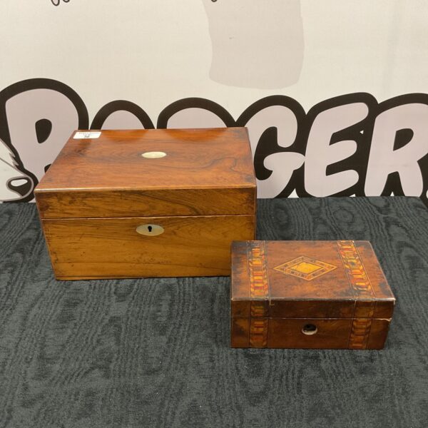 Pair of vintage wooden boxes for storage and display.