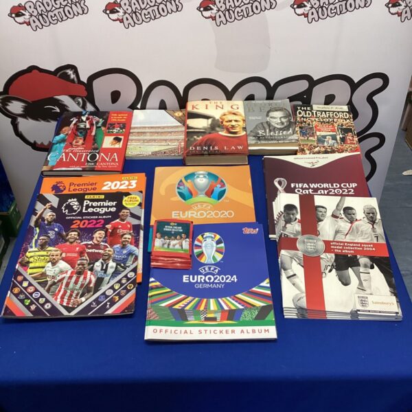 Collection of vintage football sticker books, including Panini releases.