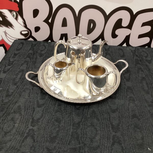 Vintage silver plate coffee set on a tray.