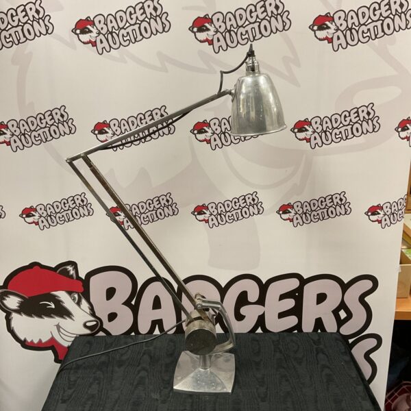 Vintage stainless steel architect desk lamp for task lighting.