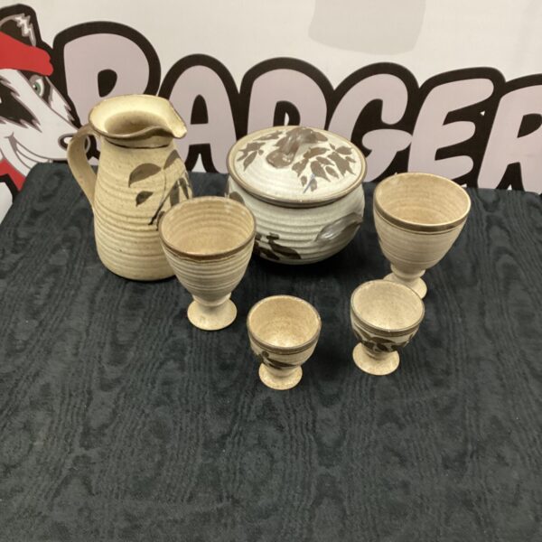 Rustic handmade pottery goblets for farmhouse decor.